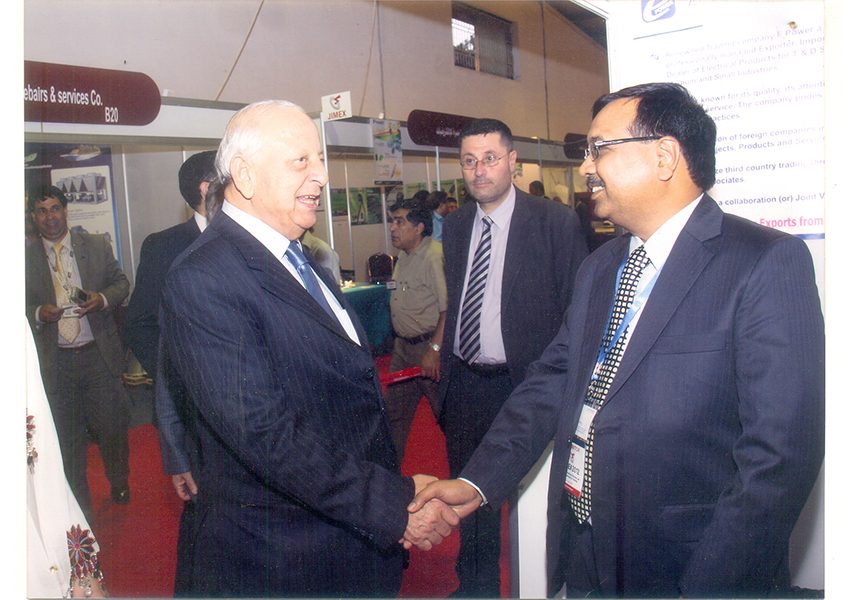 E Power Engineering team beside the company exhibition booth