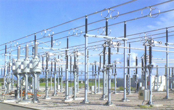 Outdoor air-insulated switchyard with lattice structures and insulators
